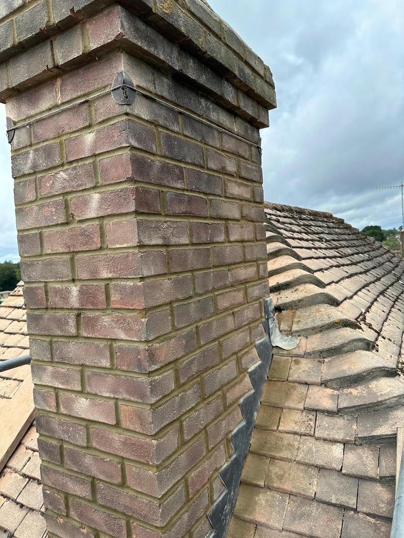 pointing to chimney in Tunbridge Wells